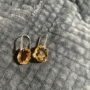 Who’s are a very beautiful and elegant pair of Swarovski crystal earrings.